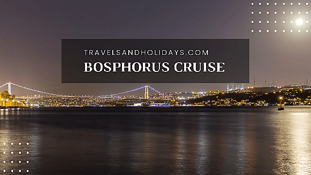 Dusk view overlooking Bosphorus Strait with bridge connecting Asia and Europe lit up in distance at night